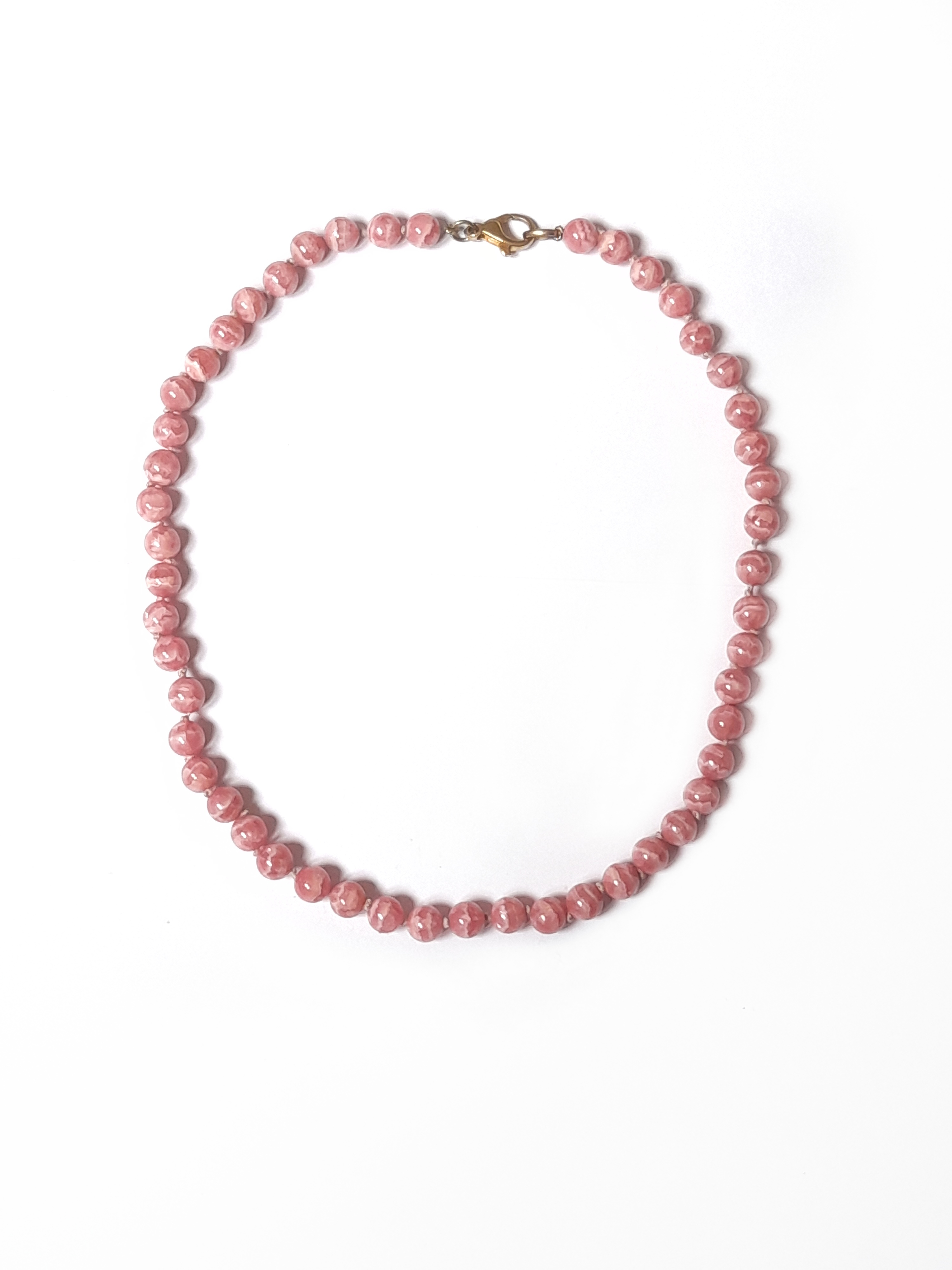 Vintage pink gemstone beads necklace. Rhodochrosite bead necklace with gilded silver closure.