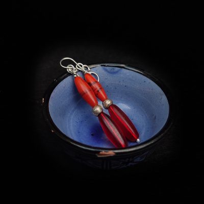 Handmade red glass beads dangle earrings. These red and silver earrings are made of old red Nepali glass beads, and antique African red glass beads.