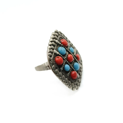 Antique large silver ring with multiple Turquoise and Coral stones. The front of ring is a diamond-shaped.