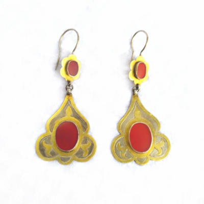 Carnelian earrings from the Tekke people of Turkmenistan. Made of gilded silver with a red Carnelian gemstone.