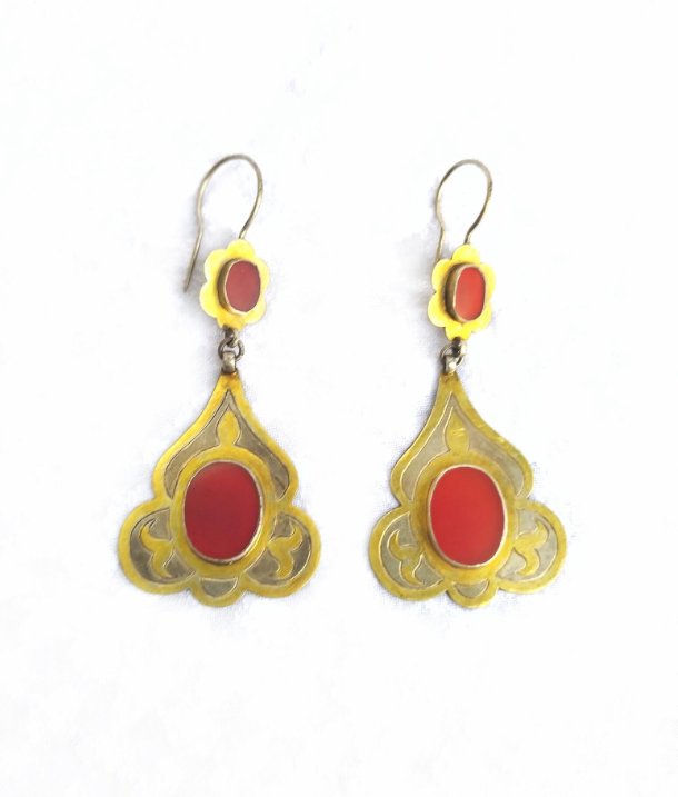Carnelian earrings from the Tekke people of Turkmenistan. Made of gilded silver with a red Carnelian gemstone.