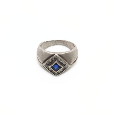 Vintage silver ring with blue Sapphire gemstone and multiple small zirconia gems