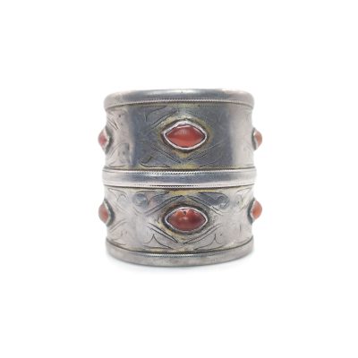 Antique silver and Carnelian Turkmen cuff bracelet. Tekke tribe open cuff bracelet with carnelian 'eyes' and (faded) gilded silver