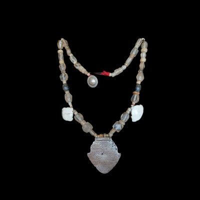 Beaded necklace with pre-islamic ancient Quartz, Onyx, Seashell beads and a silver Telles Hand of Fatima pendant with chiseled verses of the Holy Quran.